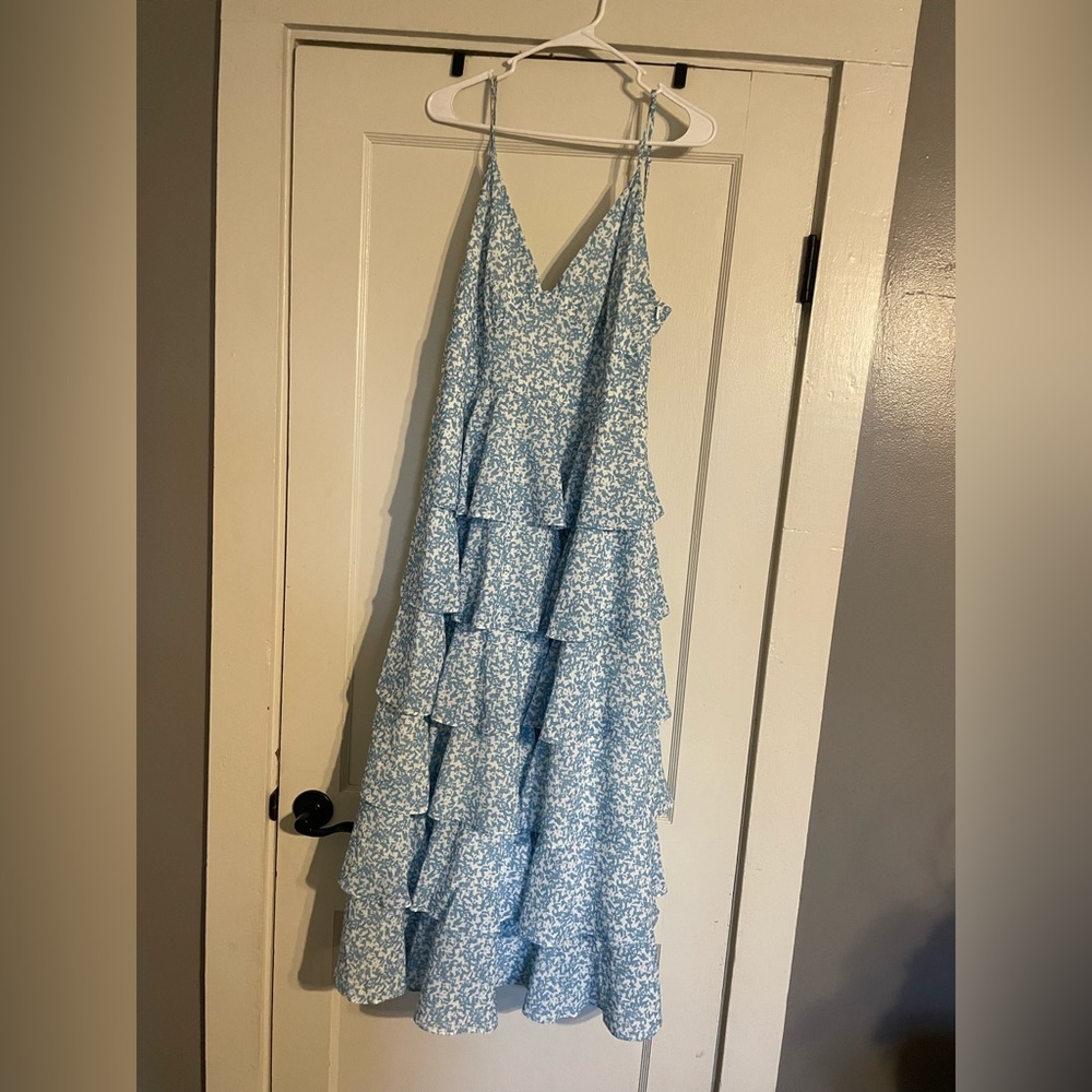 3/4 length blue and white spaghetti strap dress.
